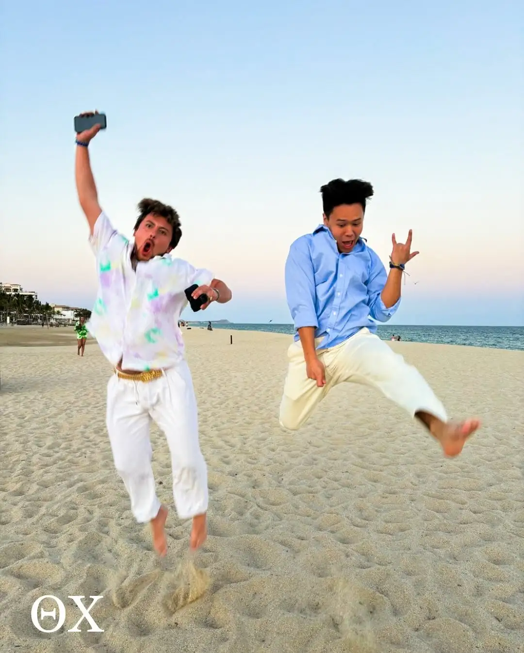 beach jump candid at sunset