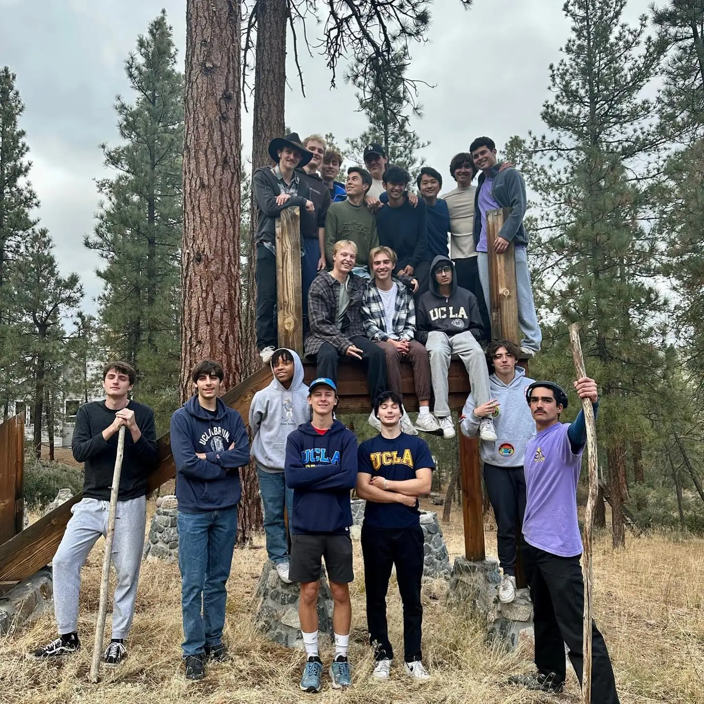 retreat crew on forest rocks