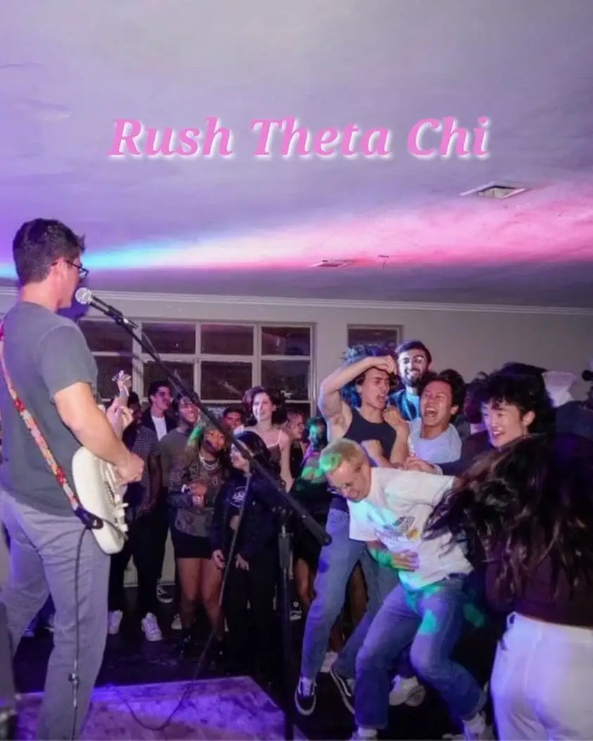 A live band mid-set at a house show