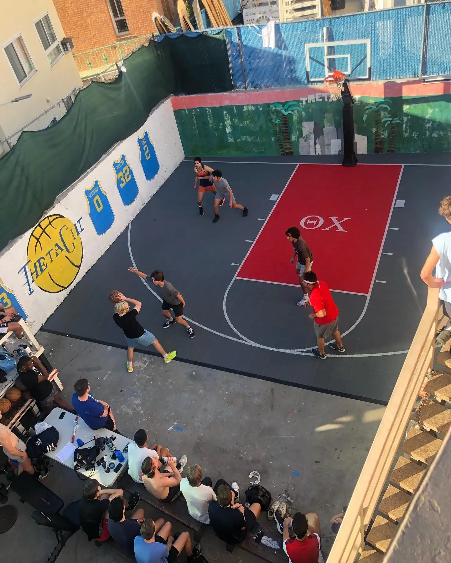 overhead of ΘX branded basketball court game