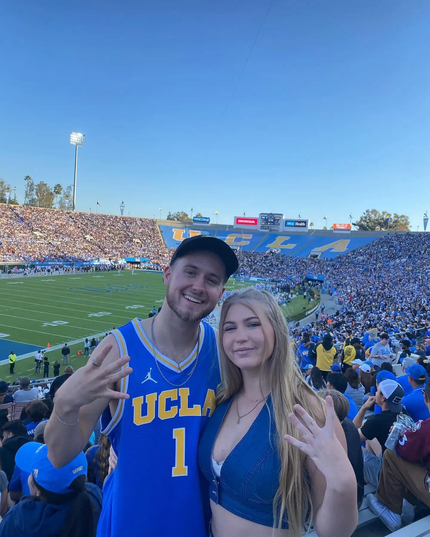 couple in UCLA gear at Rose Bowl stands