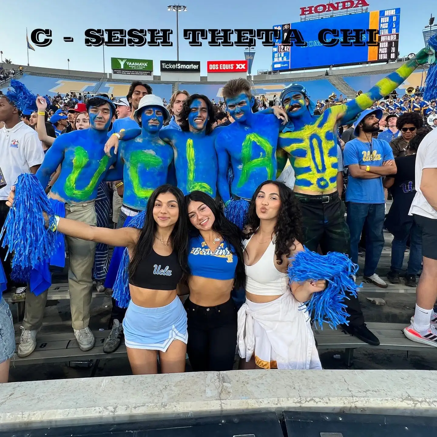 painted-chest UCLA crew in stadium, high spirit