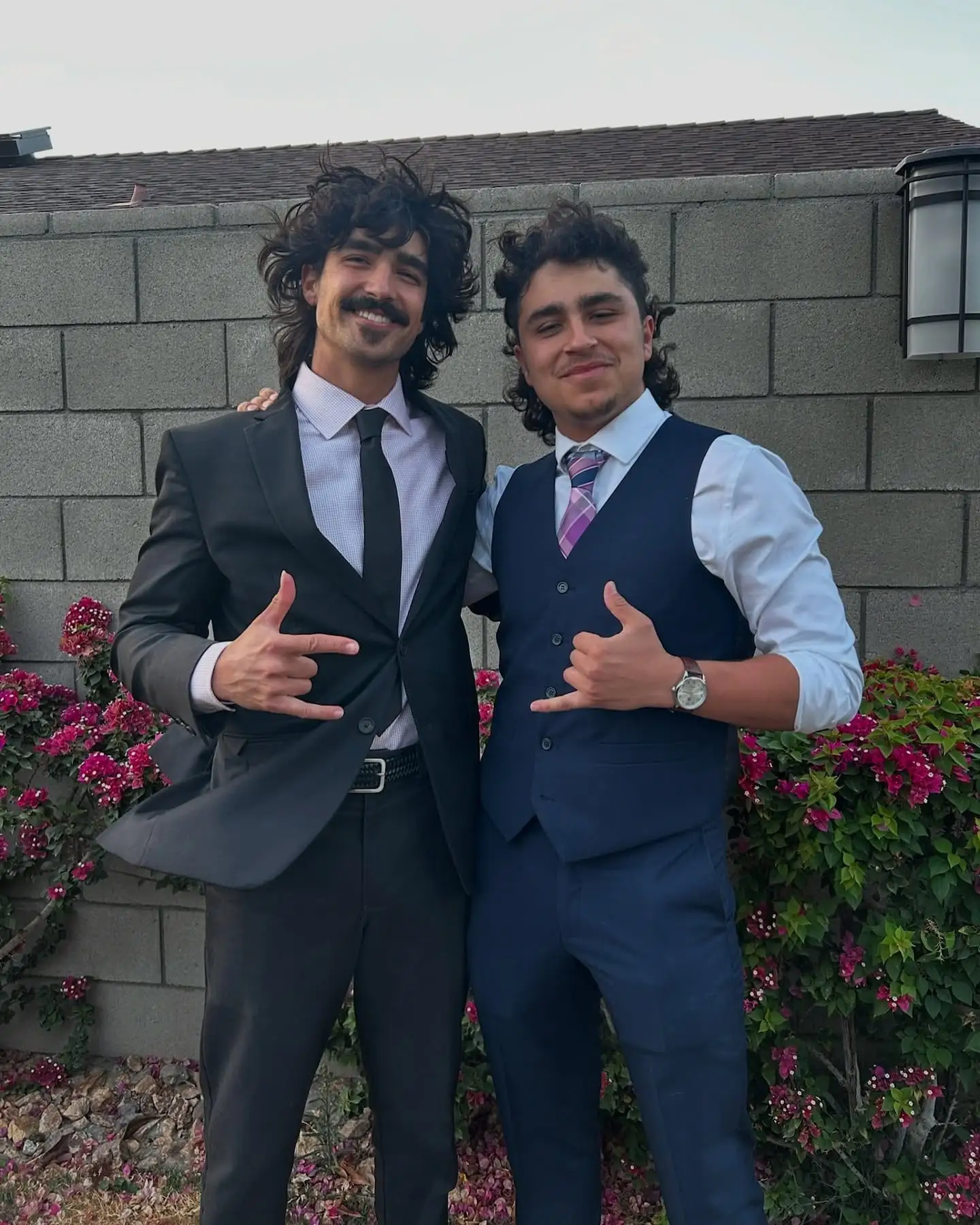 suited duo shakas
